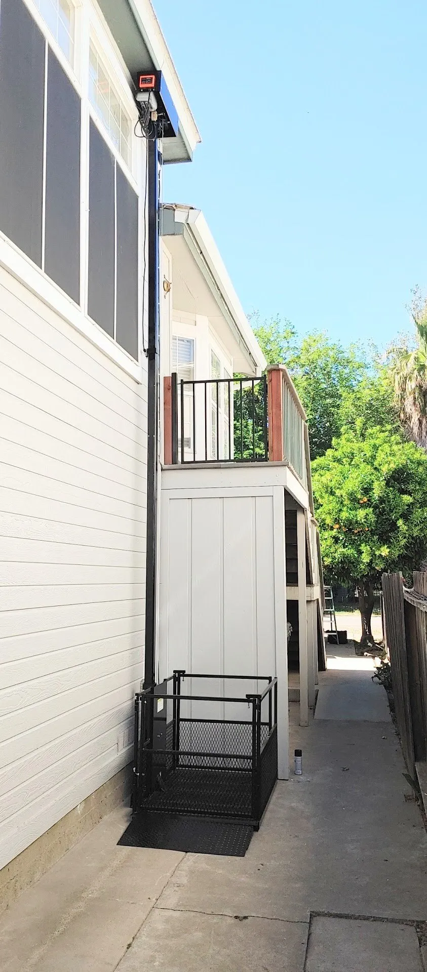 Low-rise armed-base lift with surrounding walkway visible