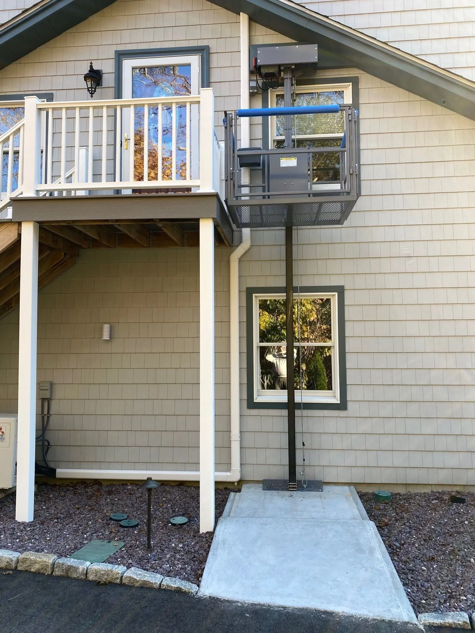 Complete base-bracket lift installation at a deck