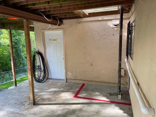 Indoor lift with platform, controls, and landing visible